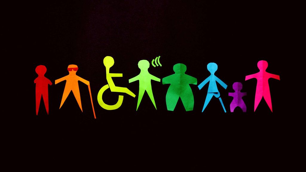Paper cutouts representing diverse disabilities, symbolizing the Americans With Disabilities Act for employees in Arizona.