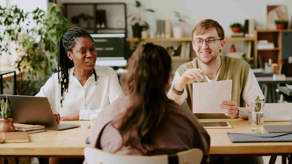Employee discussing with employers, highlighting why talking to your employer is key to protect career during opioid rehab.